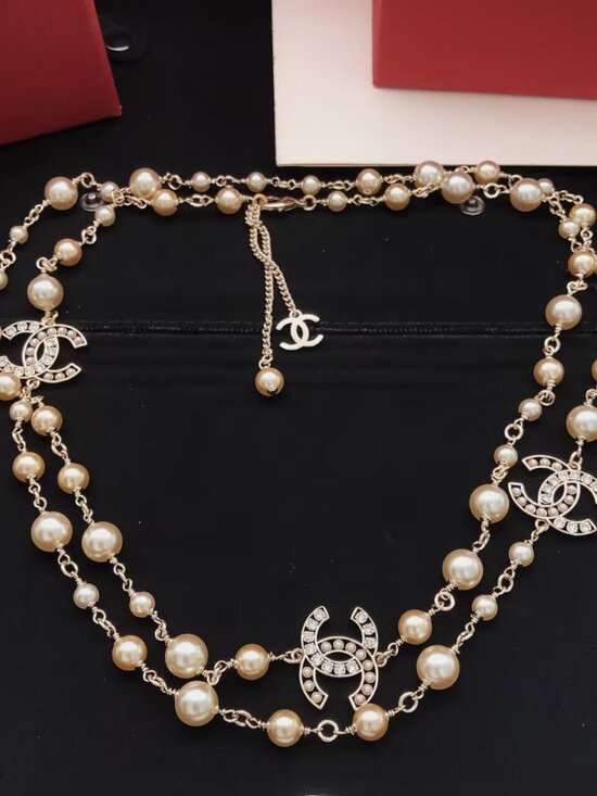 CHANEL Jewelry - Chanel Long Pearl Necklace with Crystal CC Logos